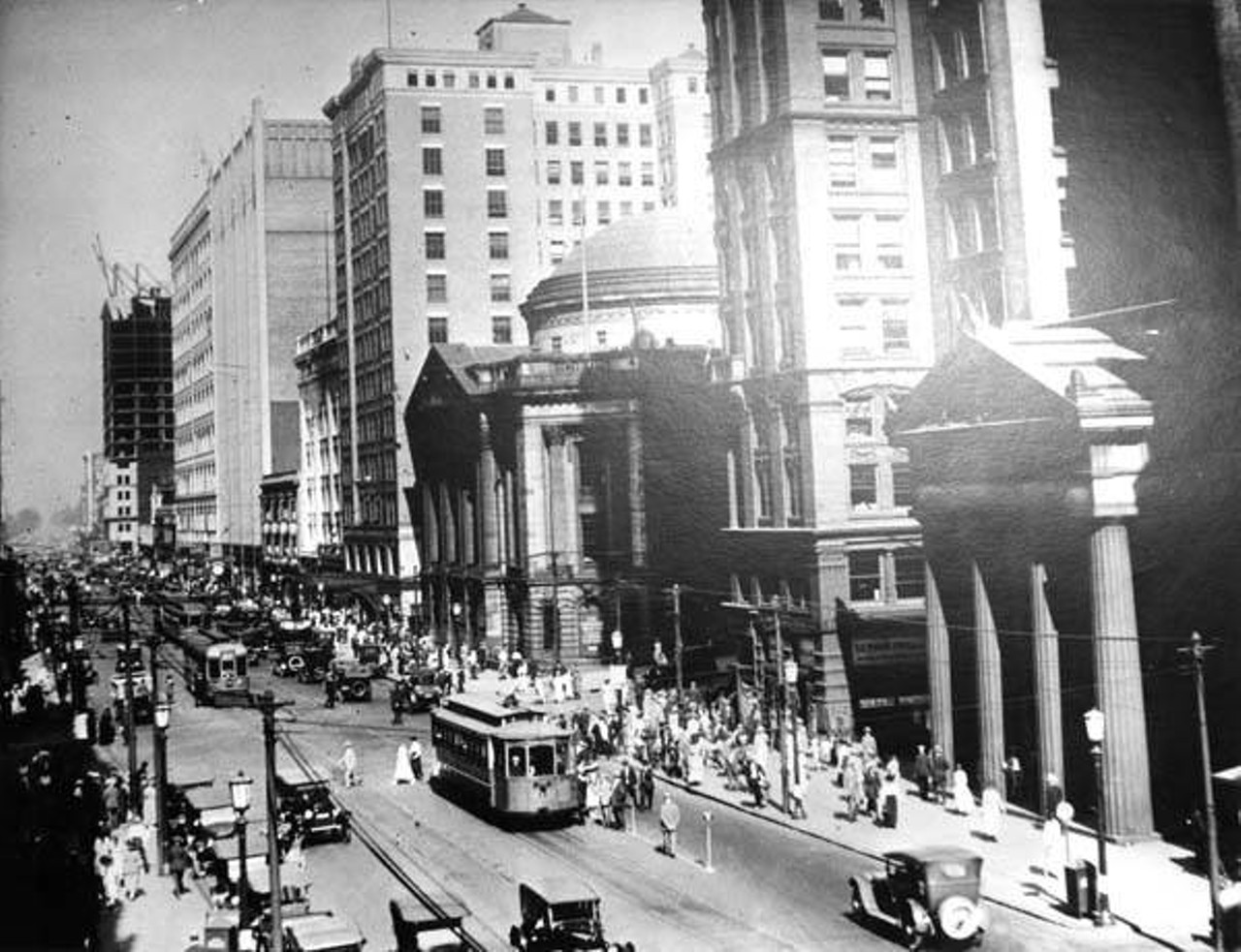 Trolley cars at Euclid and East 9th St., Hanna Building visible, 1921