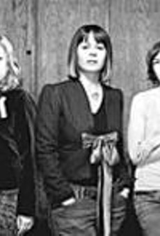 When Sleater-Kinney parted ways with its publicist, 
    booking agent, and label, uncertainty over the future 
    inspired The Woods.