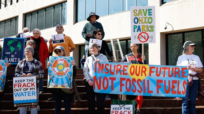 COLUMBUS, OH — FEBRUARY 26: Terri Sabo (far right) with activists from Save Ohio Parks in front of the corporate office headquarters of Nationwide Mutual Insurance Company to protest fracking under State Parks and Wildlife Areas, February 26, 2024, at One Nationwide Plaza in Columbus, Ohio.