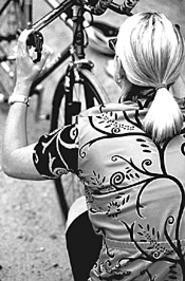 Women learn how to handle their ride at Bicycle - Survival & Maintenance 101.